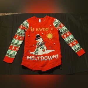 Festive Orange Kids Sweater with Snowman Design